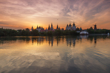 Fototapeta na wymiar Summer landscape with russian Kremlin at sunset