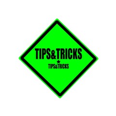 Tips and tricks black stamp text on green background