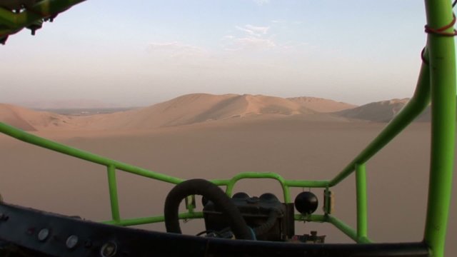 trip with a buggy in dunes. Huacachina, Ica, Peru