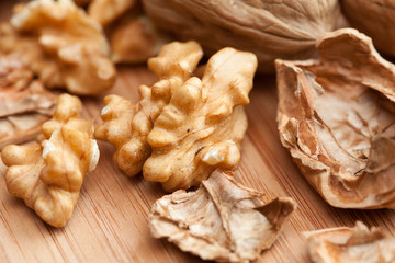 Walnuts on wooden background