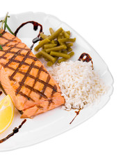 Roasted salmon fillets with rice.