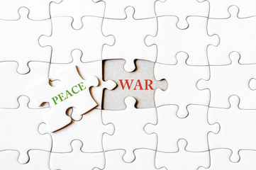 Fototapeta premium Missing jigsaw puzzle piece with word PEACE