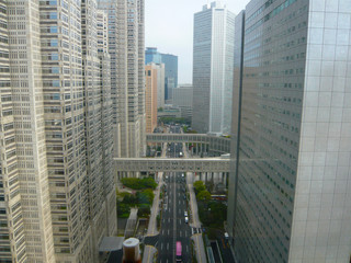 Fototapeta premium road through the building perspective shinjuku