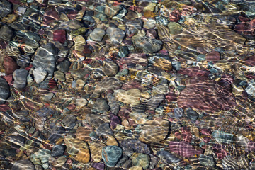 colourful pebbles under water