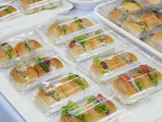 Bread, Salad and pork pack in plastic box, for meeting break.