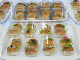 Bread, Salad and pork pack in plastic box, for meeting break.