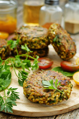 spicy vegan curry burgers with millet, chickpeas and herbs