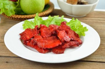 Fried pork on white plate