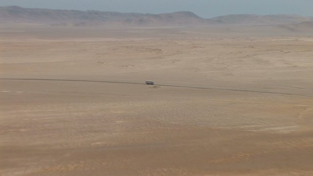 Truck in Desert, Paracas National Park, Peru 
