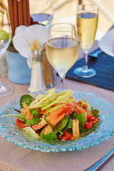Delicious salad with smoked salmon and prawns