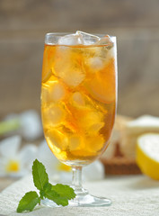 cups of tea with mint on wooden table