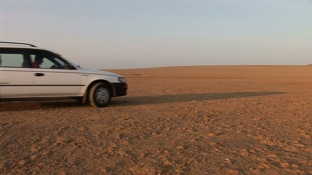 Car in Desert: Paracas National Park, Peru 
