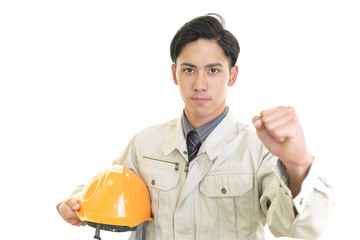 ガッツポーズの労働者