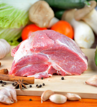 fresh pork meat on a cutting board