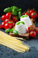 Fresh ricotta with tomato and basil