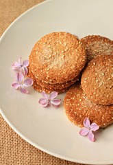 fresh home baked oatmeal cookies  plate flowers  breakfast