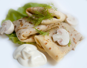 Crepes with the chicken, mushroom, lettuce 