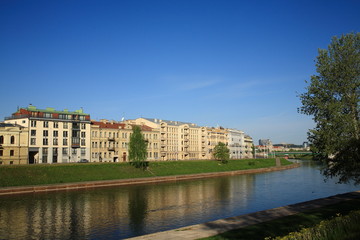 Fototapeta na wymiar Buildings on the River Neris bank