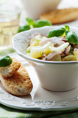 Healthy salad with octopus, celery and potato