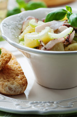 Healthy salad with octopus, celery and potato