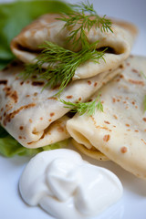 Crepes with the chicken, mushroom, lettuce 