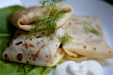 Crepes with the chicken, mushroom, lettuce 