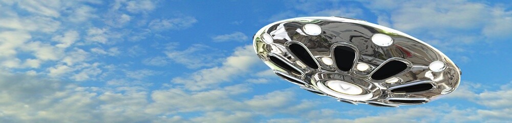 Fototapeta na wymiar UFO flying saucer in the sky