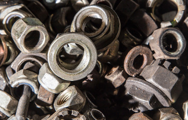 Detail of different metallic bolts and nuts