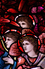 Three angels in stained glass