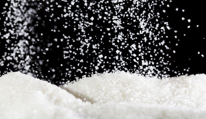 sugar on a black background