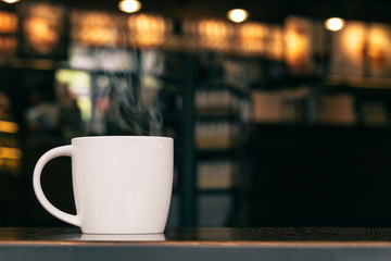 White Coffee Mug On Wooden Table In Cafe With Copyspace : With S