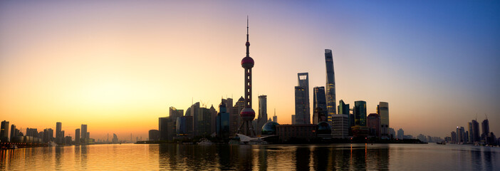 Naklejka premium Pudong skyline panorama at sunrise, Shanghai, China