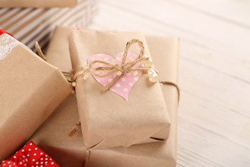 Beautiful gift boxes on wooden background. Valentine Day concept