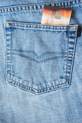credit card in the pocket of jeans. close-up
