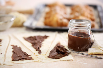 Making croissant cookies.