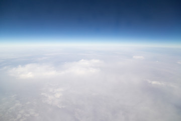 Naklejka na ściany i meble sky with clouds view from the airplane