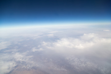 Naklejka na ściany i meble sky with clouds view from the airplane