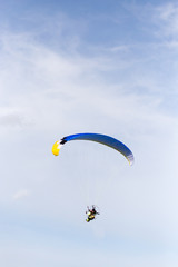 parachutist in the sky