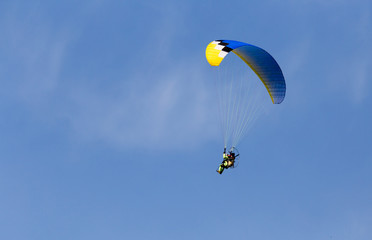 parachutist in the sky