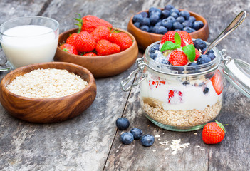 fresh yogurt with oat flakes and berries