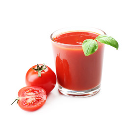 Glass of fresh tomato juice isolated on white