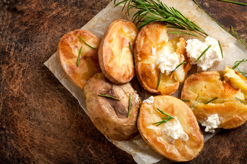 Roasted potato on rustic background