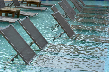 Chairs in Pool