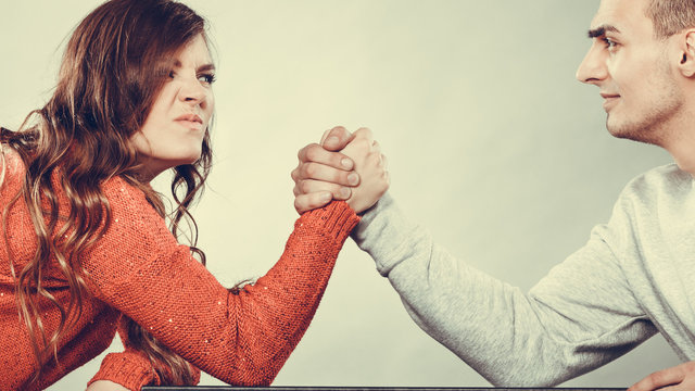 Arm Wrestling Challenge Between Young Couple