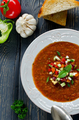 Fresh gazpacho on a wooden table
