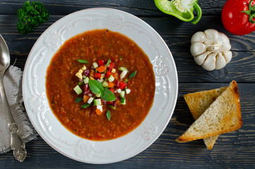 Fresh gazpacho on a wooden table