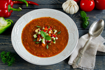 Fresh gazpacho on a wooden table