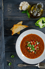 Fresh gazpacho on a wooden table