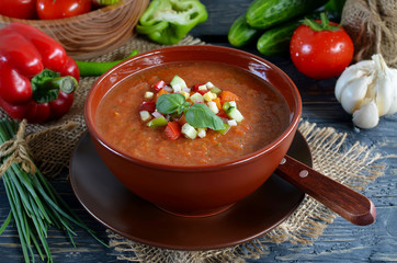 Fresh gazpacho on a wooden table