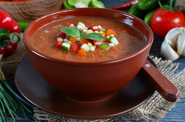 Fresh gazpacho on a wooden table